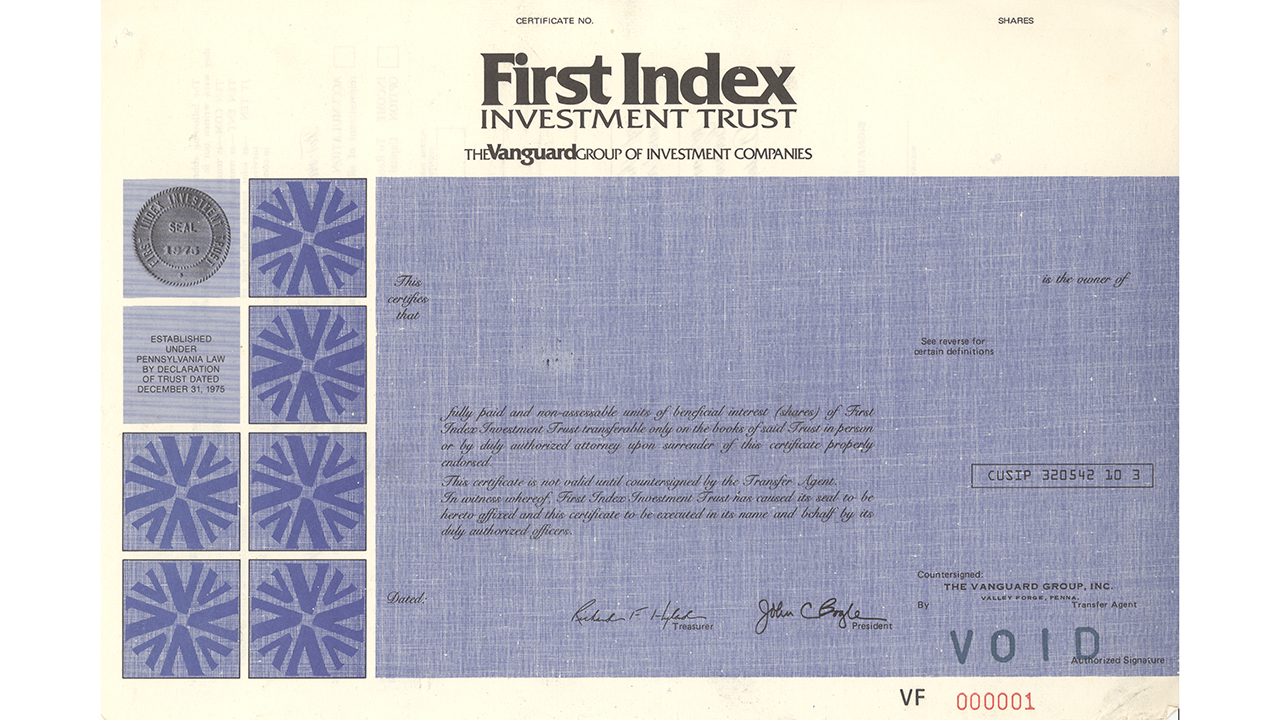 An image shows a physical share certificate for First Index Investment Trust, a member of The Vanguard Group of Investment Companies. 