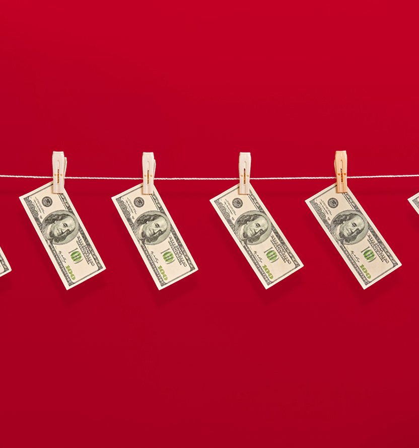 dollars hanging on clothesline