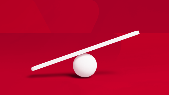 white see saw on red background